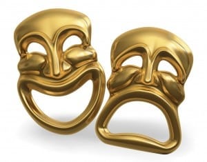 A 3d rendering of the classic comedy-tragedy theater masks isolated on white with a clipping path